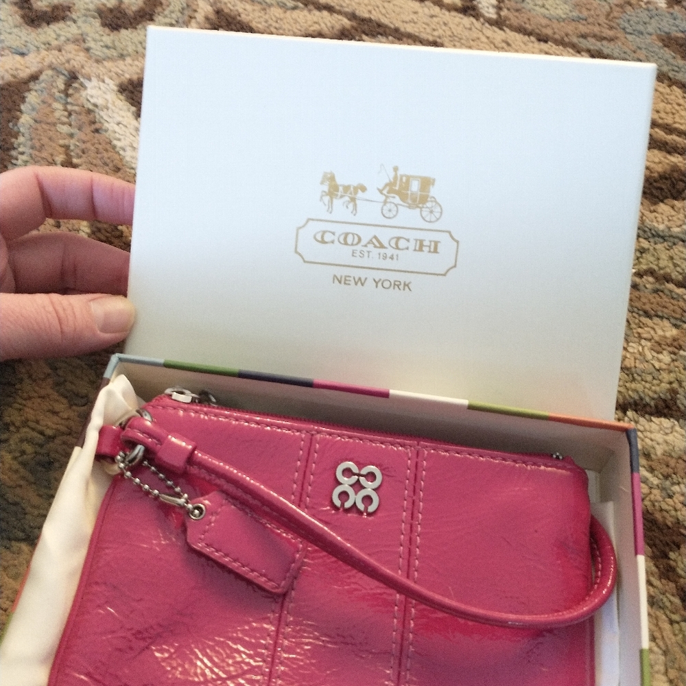Coach Wristlet with packaging and drawstring bag